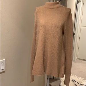 Faux turtleneck sweater exposed back